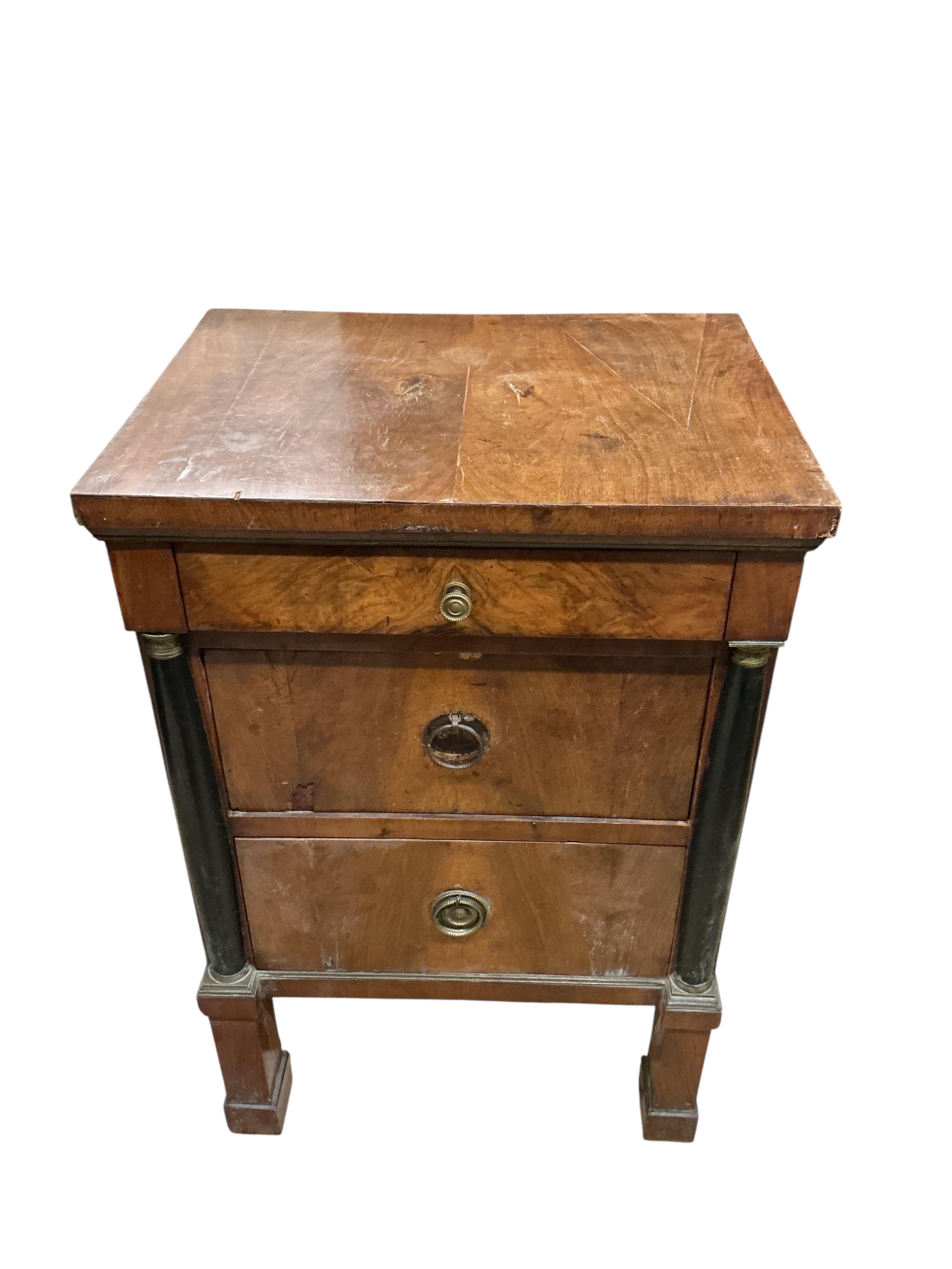A 19th century Biedermeir style part ebonised walnut narrow commode, width 47cm, depth 44cm, height 84cm
